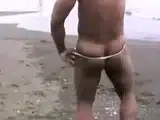 Muscled Asian Stud Bares Almost All at the Beach