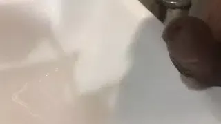 Professional handsome office guy strokes his cock after pissing to relief himself from stress