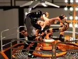 Male android plays with a horny girl in restraints